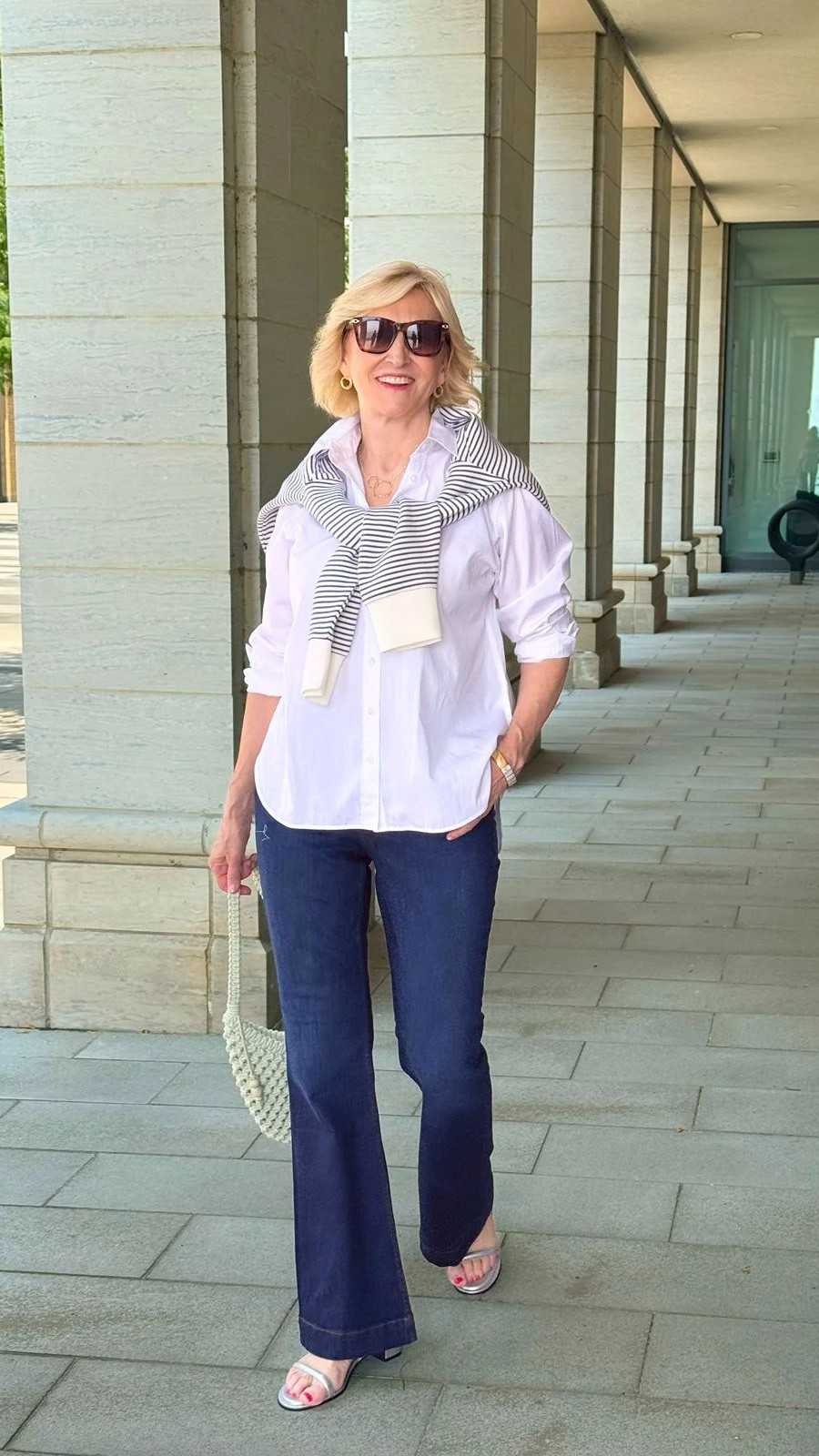 I’m always a fan of an outfit that looks put together but still feels effortless 🤍

This Spanx look is giving classic with a casual twist — a crisp white collared shirt, flared denim and a striped sweatshirt casually tied around the shoulders. I love how that little pop of stripes makes the whole outfit feel more relaxed and styled without trying too hard.

Definitely one of those looks I’d reach for when I want to feel polished but comfortable. ✨

#LTKOver40 #LTKSeasonal #LTKootd