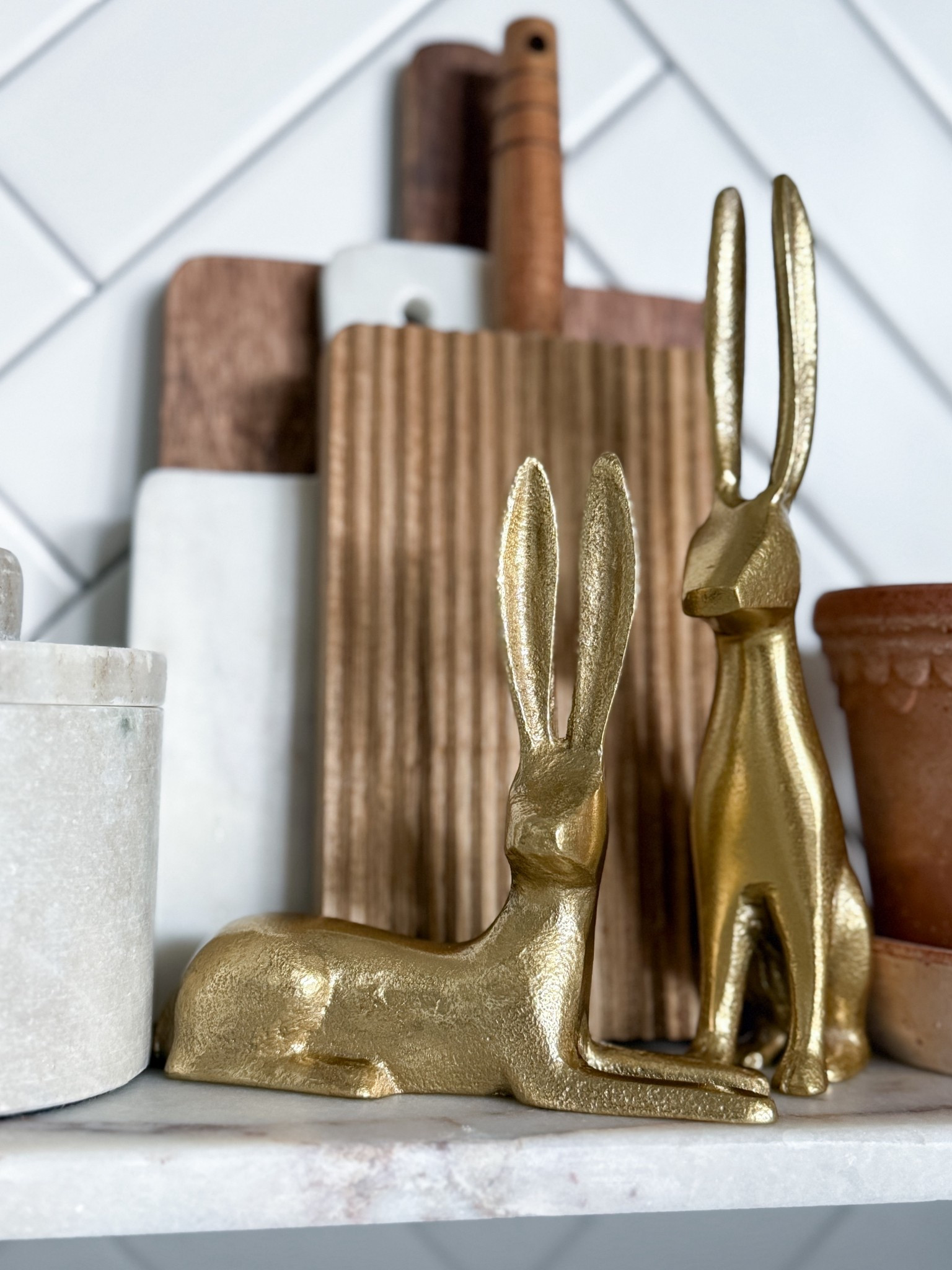 These little gold bunnies are the easiest way to add a soft spring touch. I love how they warm up a neutral kitchen shelf & mix perfectly with wood + marble accents. Simple, timeless, & so cute styled for the season.

spring home decor - gold bunny decor - brass rabbit figurine - neutral kitchen styling - shelf styling ideas - easter home decor - modern farmhouse decor - spring shelf decor - kitchen counter styling - neutral home aesthetic - seasonal home accents - elevated everyday decor

#LTKHome #LTKSeasonal