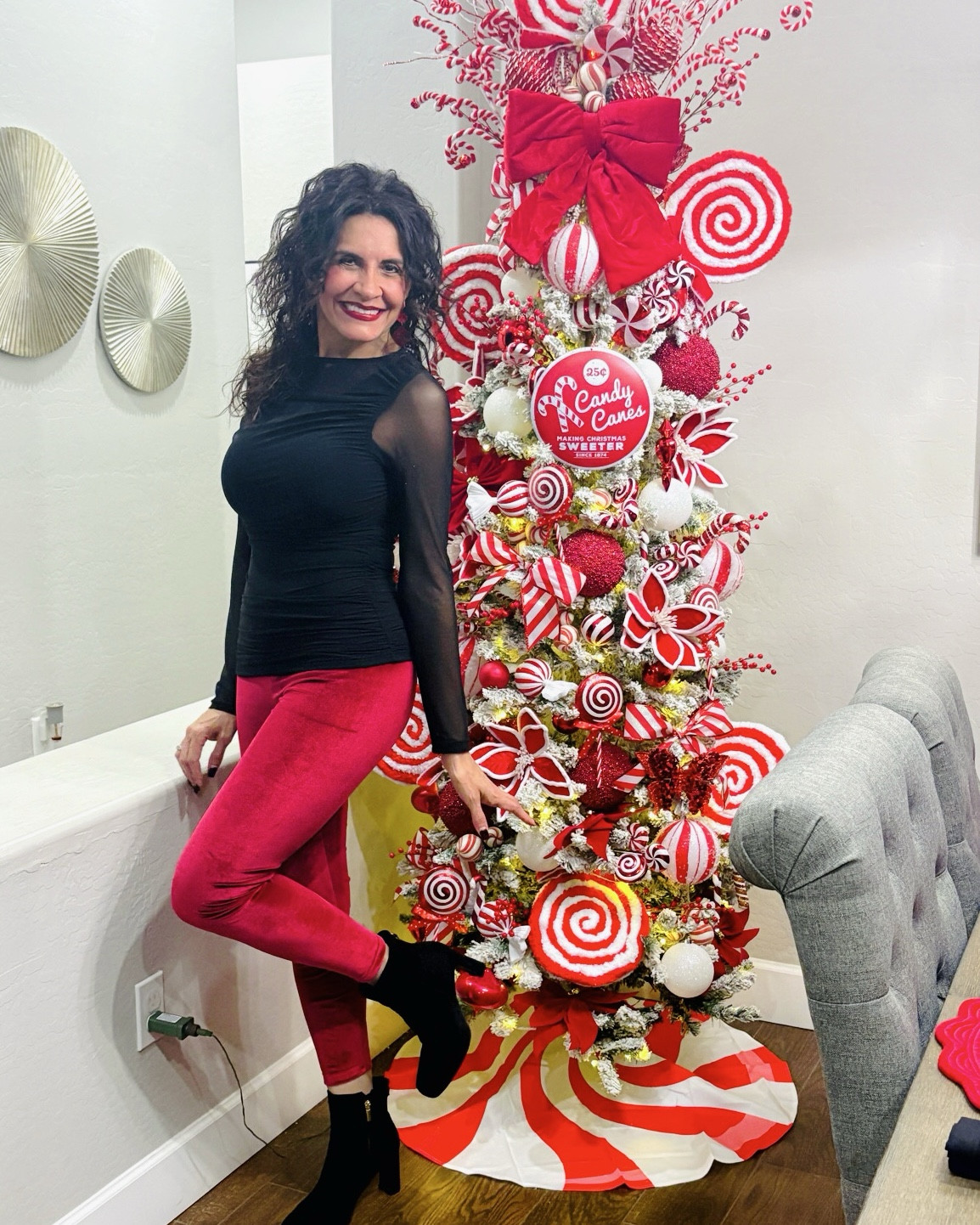 One peppermint tree finished… and these red velvet leggings + my love for decorating have me feeling extra festive. ❤️🎄 I wanna know… are u done decorating? How many trees do you decorate? 

#peppermintchristmastree #ohchristmastree #candycanetree

#LTKFindsUnder50 #LTKHoliday #LTKSeasonal
