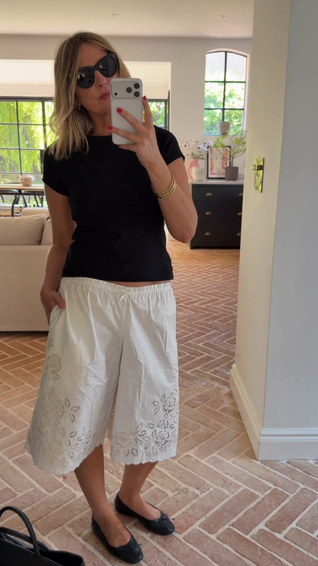 Summer shorts outfit / Bermuda shorts / weekday / baby tee / ballet flats / heatwave outfit

#LTKuk #LTKsummer #LTKeurope
