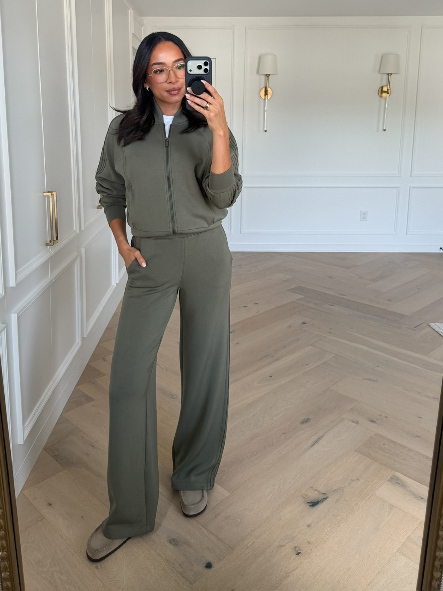 Use code AE25 to save 25% off full priced AirEssentials!! This material is my favorite of all time for loungewear, travel and my go-to airport outfit! The moss green color is perfect for fall 🤩 Wearing size S white tank, size S track jacket and size XS wide leg pant

#LTKSeasonal #LTKTravel