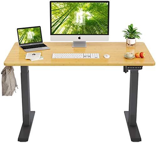 FEZIBO Height Adjustable Electric Standing Desk, 48 x 24 Inches Stand Up Table, Sit Stand Home Of... | Amazon (US)