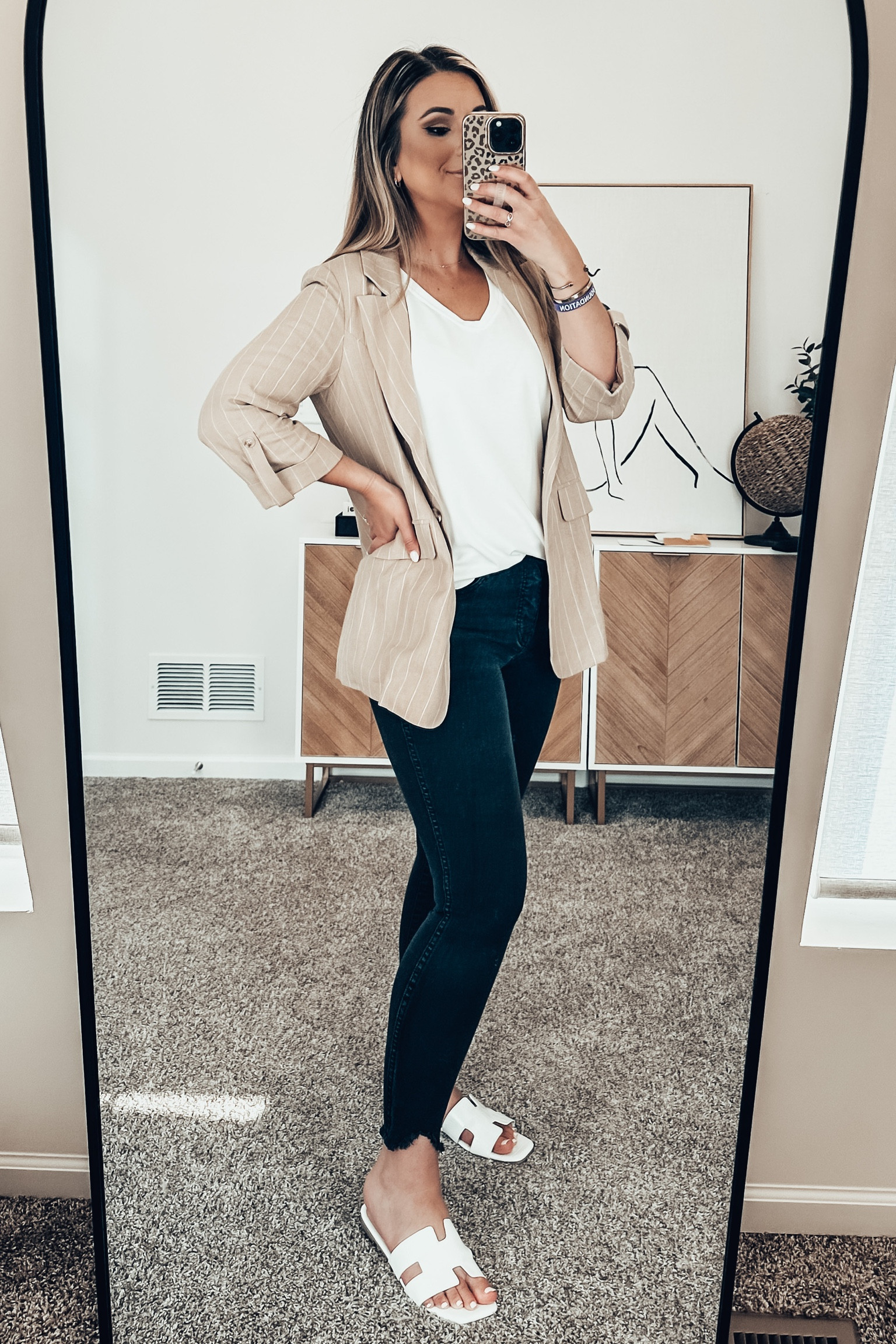Business casual outfit inspo! Petal and pup 3/4 sleeve striped light weight blazer 30% off! Steve Madden (Hermes dupe) white leather sandals on sale for $47! 

Blazer: M TTS 
Top: M TTS 
Kut from the Kloth jeans: 4 runs big 
Sandals: 8 TTS 

#LTKsalealert #LTKFind #LTKworkwear