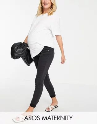 ASOS DESIGN Maternity high rise ridley 'skinny' jeans in washed black with over the bump waistban... | ASOS (Global)