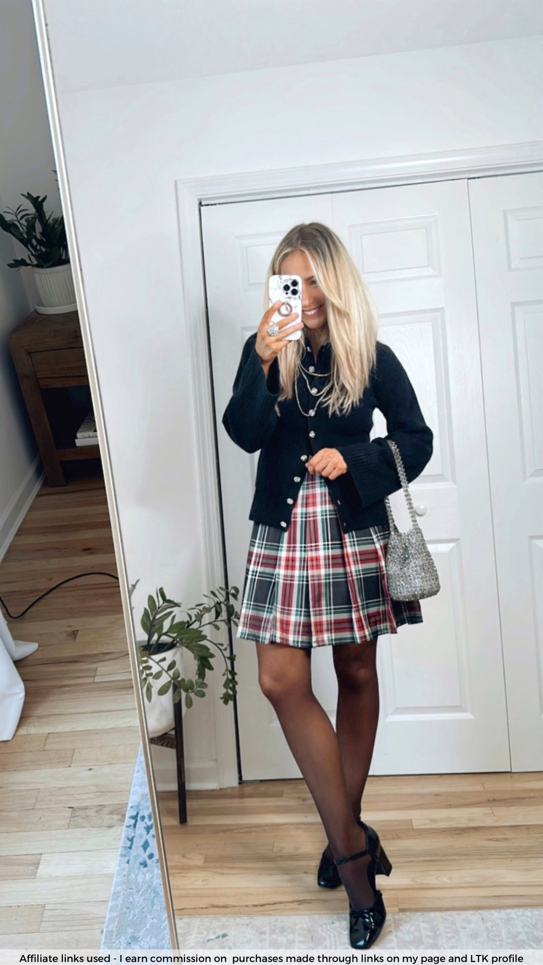 Holiday party outfit 

Tartan skirt pleated 
Black holiday sweater
Silver sequin bag


#LTKHoliday