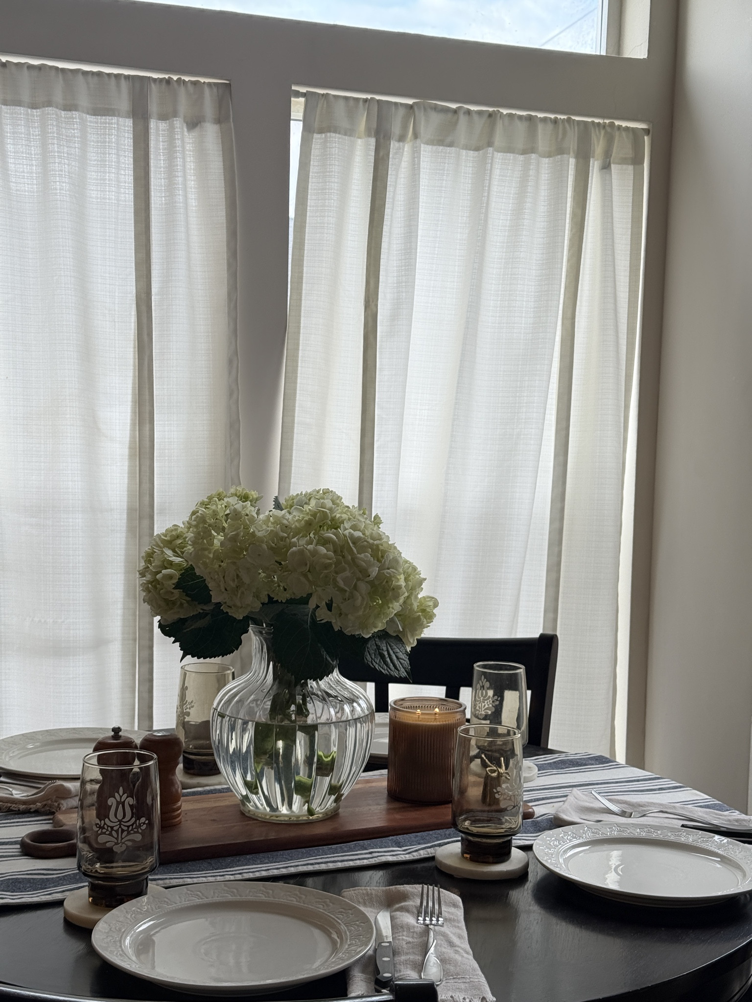 One of my favorite corners of our home 🤍 From the timeless white place settings to my adorable tie-up café curtains and vintage-inspired glassware, this little dining nook feels so cozy for everyday meals and hosting family dinners. I've linked everything I could find below!
#DiningRoomInspo #CottagecoreDecor #HomeDecorIdeas #CozyDiningRoom #CafeCurtains #VintageDecor #NeutralHome #LTKHome #HomeInspo #EverydayHosting

#LTKdayinmylife #LTKfoodie #LTKHome