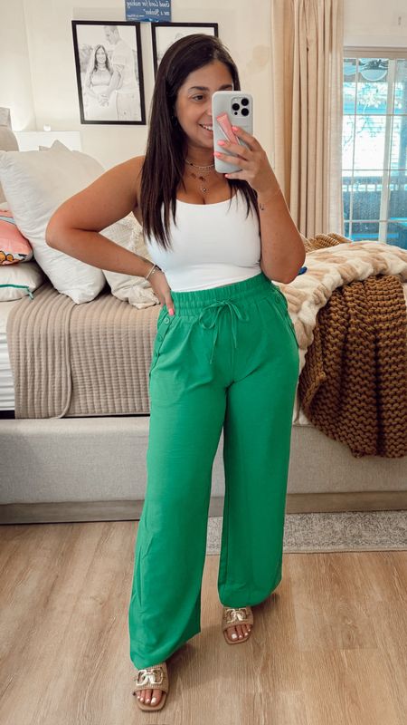 These green pants though💚💚💚 I didn’t like them at first but after a ton of compliments, I decided to keep them. Wide leg pants for summer petite friendly and available in tons of colors. I paired with white crop top and slightly wedged heels. I’m in a medium!Summer outfit, color pants, spring outfit inspo.

#LTKfindsunder50 #LTKSeasonal #LTKsalealert