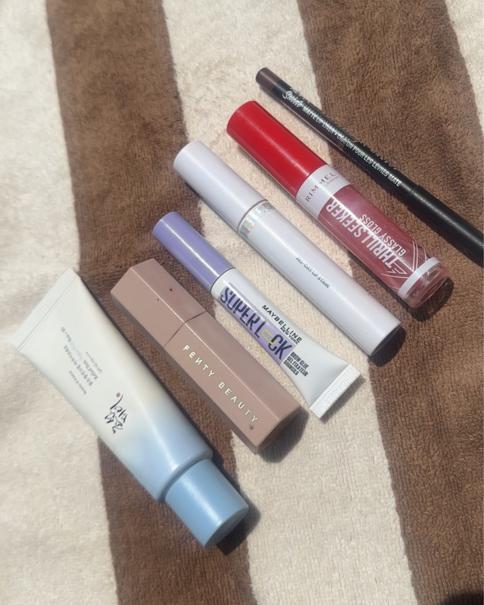 Daytime poolside skin 🫧
Beauty of joseon SPF
Fenty match stix shade truffle
Maybeline brow gel
Wonderskin lip stain in shade whimsical 
Rimmel gloss in shade suga 
Nyx lip liner in shade cold brew

#LTKsummer #LTKbeauty #LTKtravel