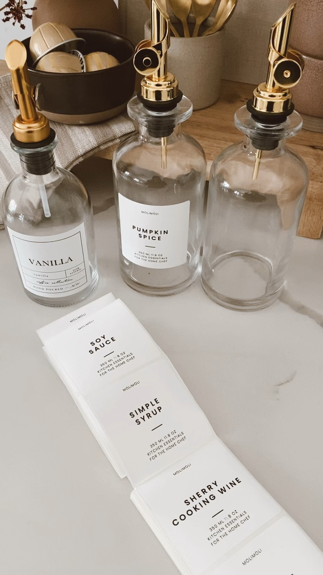 Coffee station aesthetic syrup jars #glassdecanters #syrupsispenser #oildispenser #amazonfind #amazonkitchen #labels #kitchenorganization #coffeestation #coffeebar #amazon 

#LTKunder50 #LTKhome #LTKSeasonal