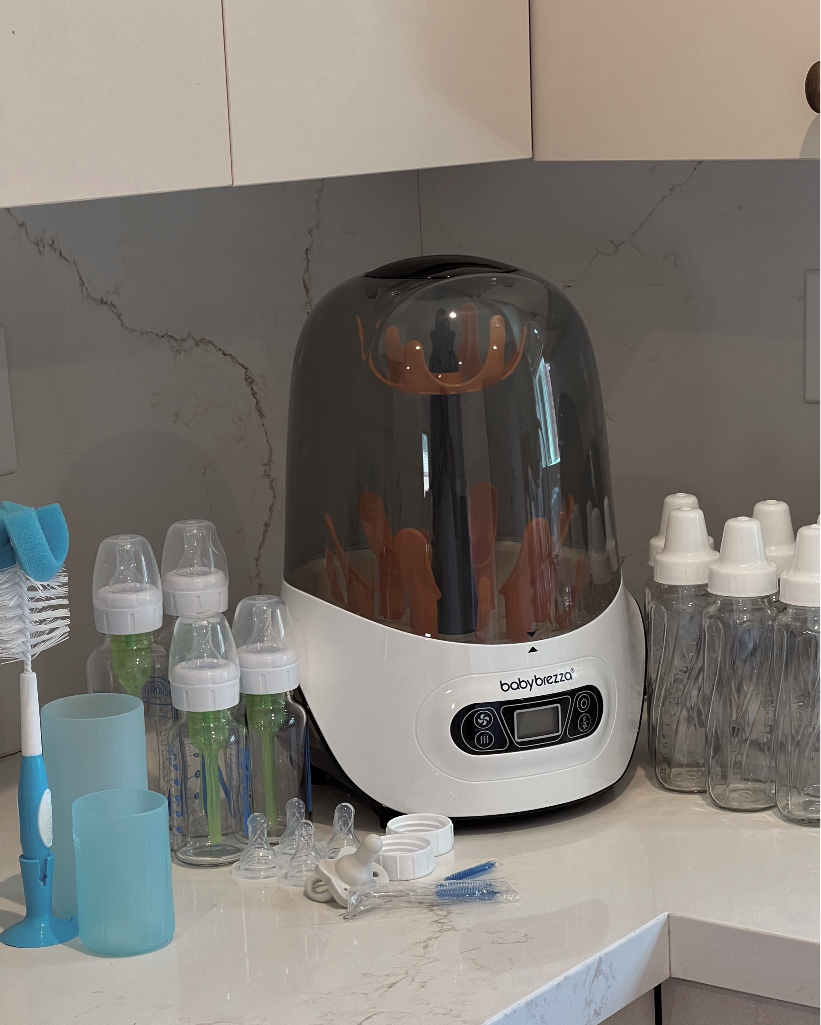 Decided to go with glass bottles so there’s less risk of chemicals and microplastics leaching when heated versus plastic bottles. I got two different brands to test out. Also linking a clean baby formula made with European standards - all of my mom friends swear by this! And the Baby Brezza dryer/sterilizer for pumping and bottles. 

Baby bottles 
Glass baby bottles 
Organic baby formula 
Clean baby formula 
Baby registry 
Clear organization bin 
Nesting 
Maternity 
Baby 
Bump
Baby bottle sterilizer/dryer 



#LTKBaby #LTKHome #LTKBump