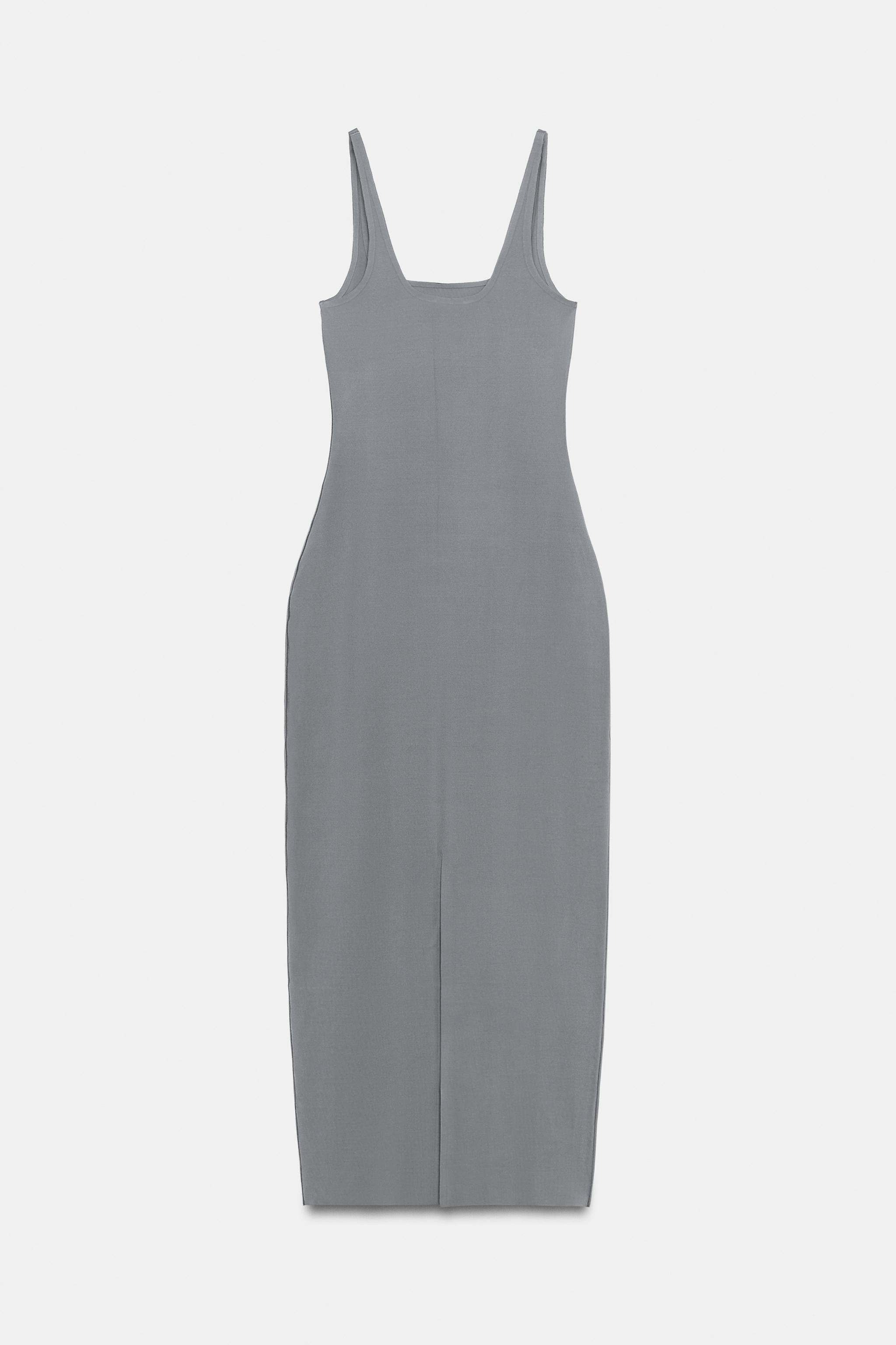 Dress made of polyamide blend yarn. Round neck and spaghetti straps. Straight hem. | Zara US