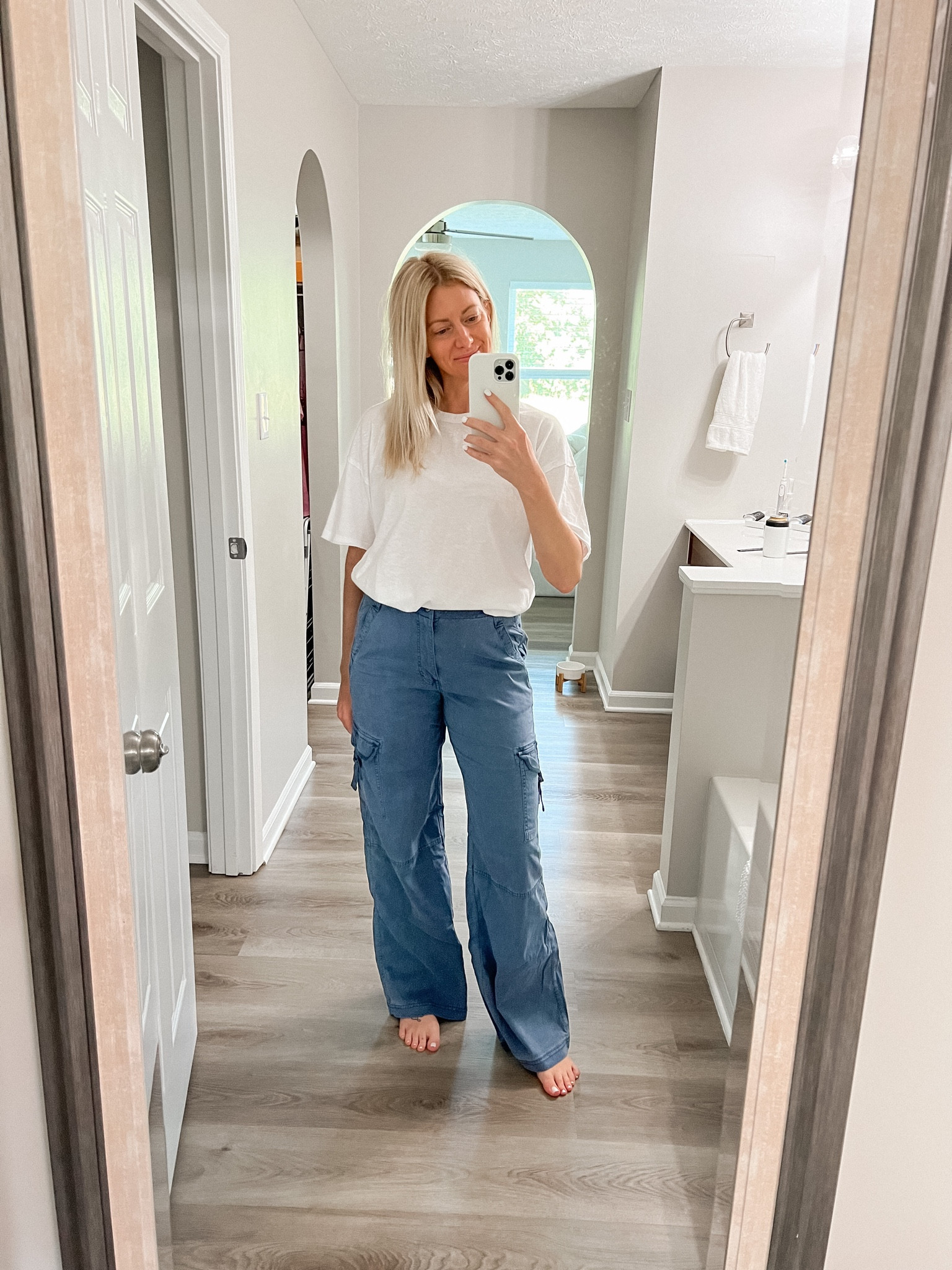 Both on sale! Wearing oversized white tee in size xs/s, blue soft baggy cargo pants size 4. The pants run big  in the waist because it’s a stretchy band, so you could size down but I like them looser. #LTKfit

#LTKunder50 #LTKsalealert #LTKstyletip
