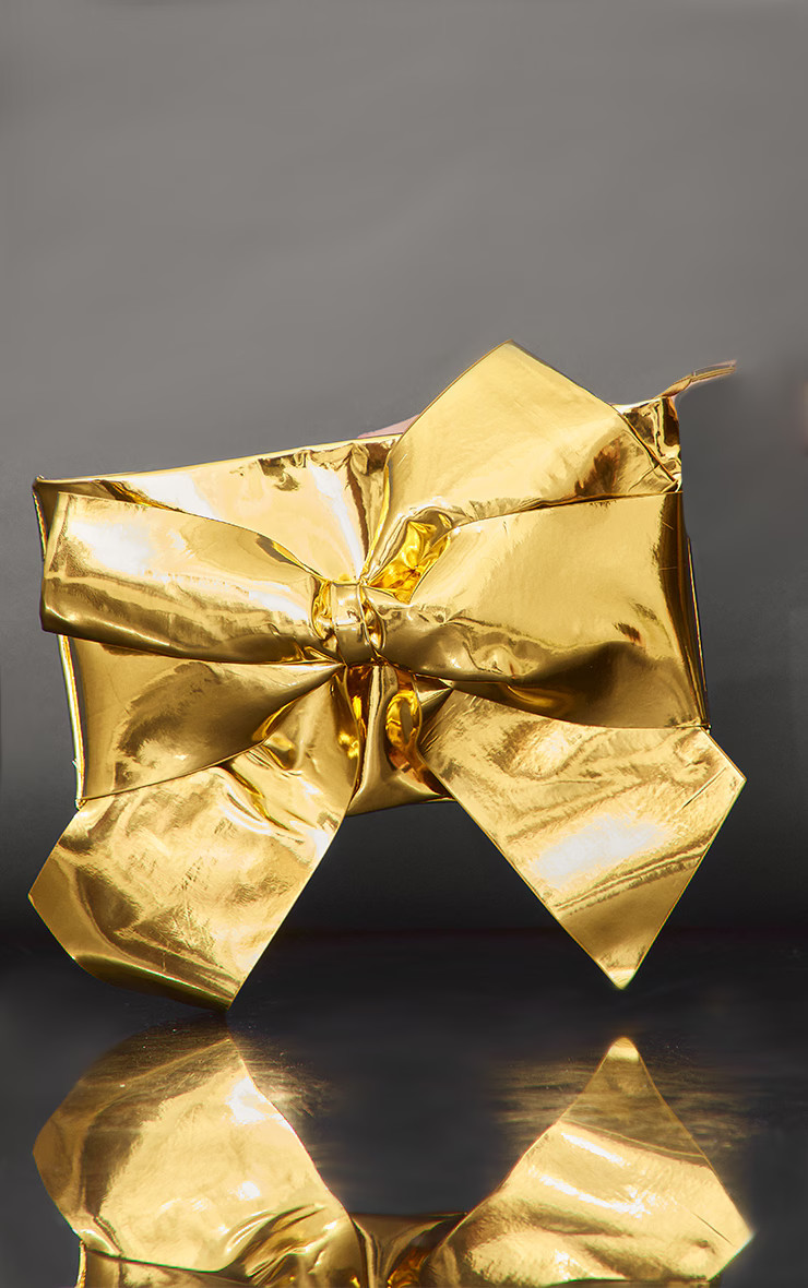 Gold Metallic Oversized Bow Clutch Bag | PrettyLittleThing US