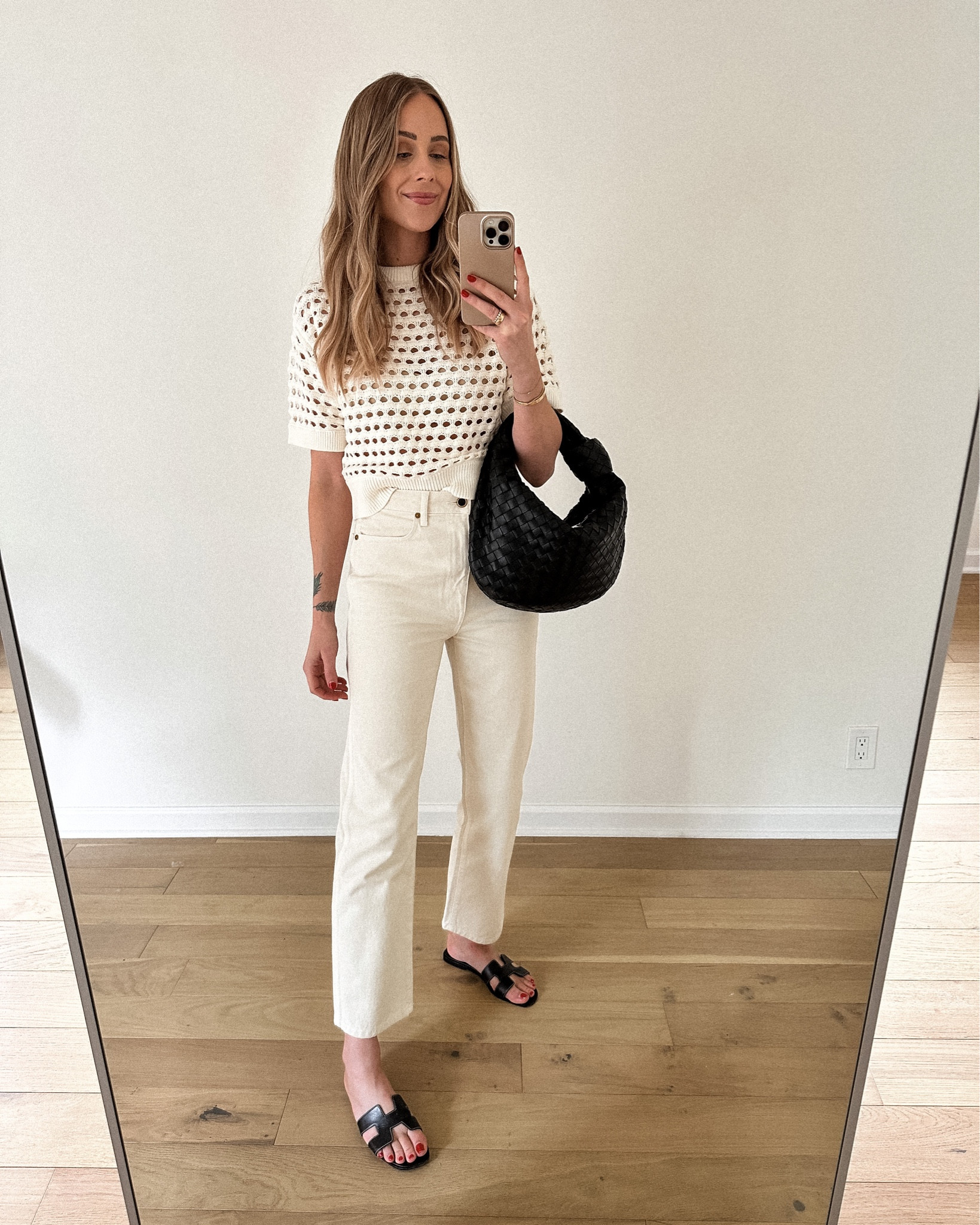 Fashion Jackson wearing white shirt sleeve knit sweater (size small) fit is boxy white jeans (size up) bottega black handbag #fashionjackson #shopbop #whitejeans #sandals #hermes #summeroutfit 

#LTKstyletip #LTKshoecrush #LTKunder100