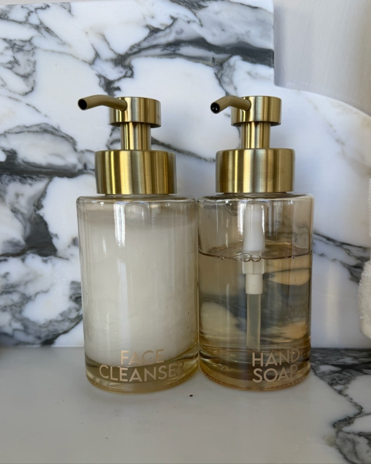 This gold Enra Thick Glass Soap Dispenser with Stainless Steel Pump from Amazon was the perfect accessory to an already flawless bathroom.  Decant your favorite soap for an elevated look! 

 #LTKHome