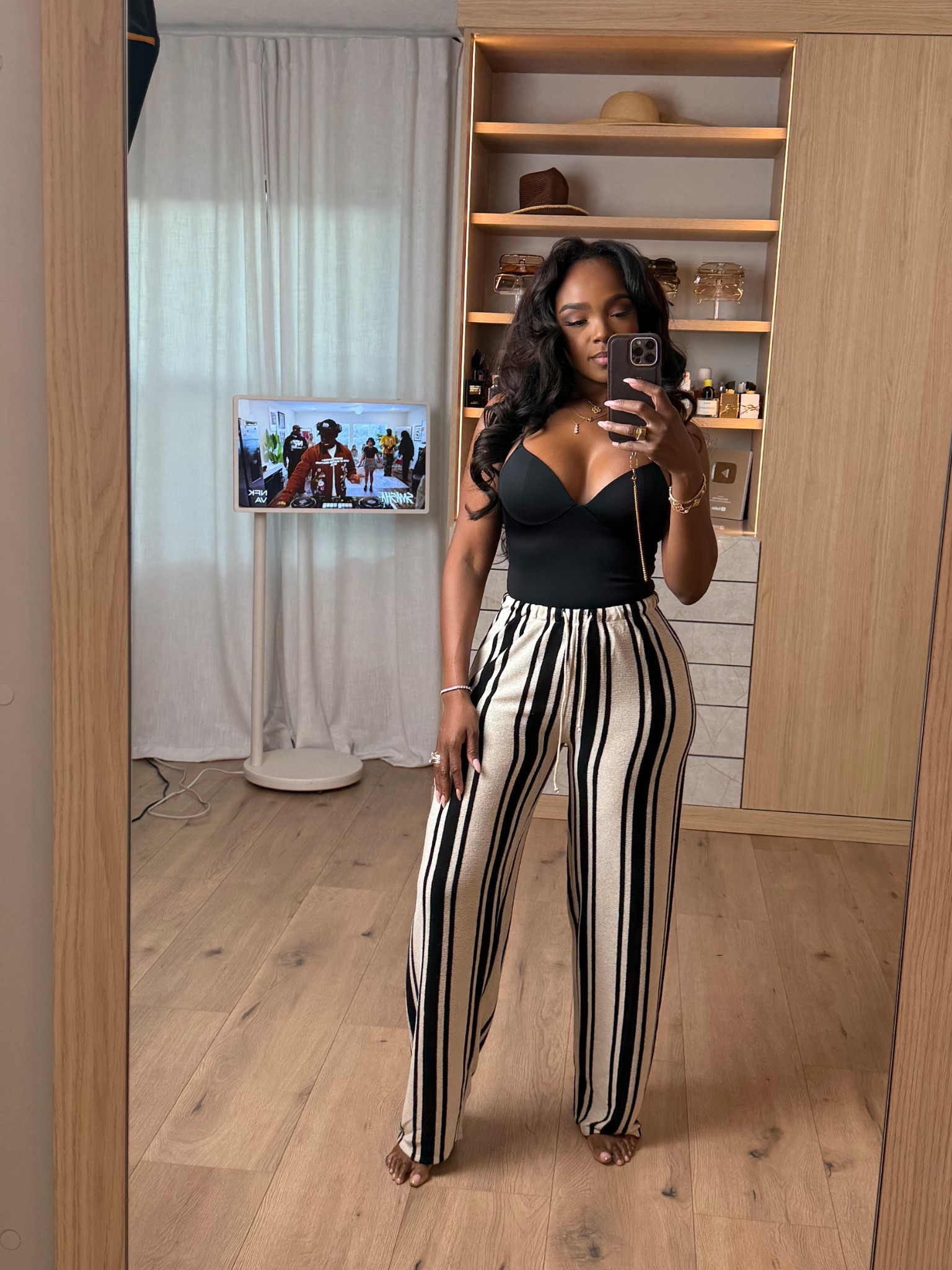 Hi babes!  

These striped pants are EVERYTHING. This is your hero piece — lightweight, elongating, and snatches the waist without clinging. If you’ve been looking for that easy, flattering summer pant… this is it.

I paired it with a simple black tank and gold accessories for that YSL-type look — clean, elevated, and expensive without actually being expensive.

These are a top seller right now and I’m calling it early — high sell-out risk. The vertical stripe + relaxed fit is exactly why these go viral every time.

At this price point, this is a no-brainer. This is that throw-on-and-look-put-together outfit you’ll wear on repeat, so the cost per wear drops fast.

Where to wear:
• Brunch  
• Vacation  
• Casual dinners  
• Everyday errands but elevated  

Everything is linked below ✨  

📏 Measurements: 5’4”, 140 lbs, 34D bust, 27” waist, 40” hips  

Follow me on Instagram and YouTube @kirasfashionfinds  


