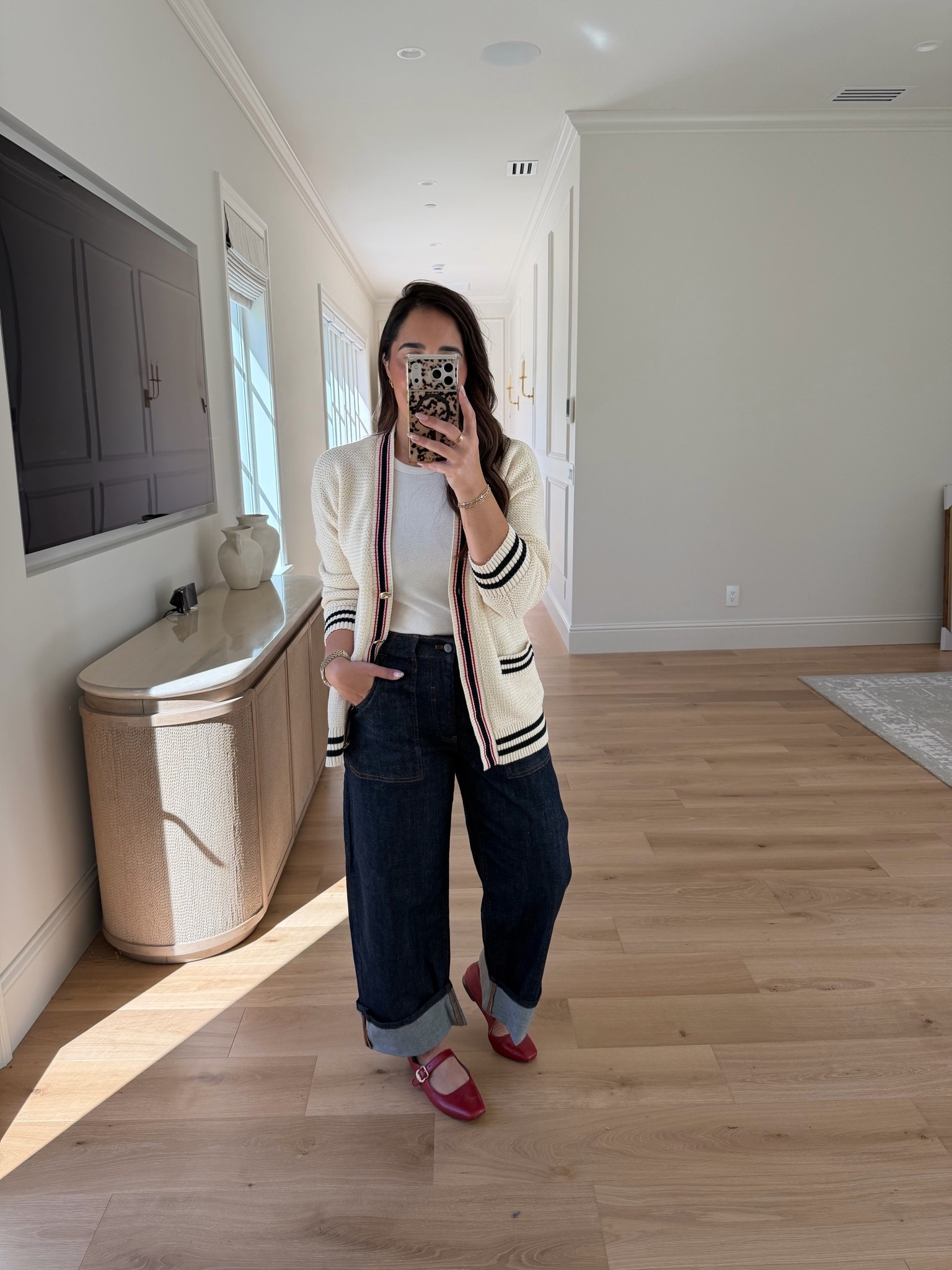 Nautical sweater and my go to carpenter pants ⚓️ use my code AURELIE20 for 20% off @Anthropologie #anthropartner