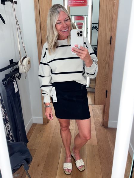 Love this striped cropped lululemon sweatshirt with a black scuba skirt and sandals. Small skirt and 4 pullover  

#LTKOver40 #LTKStyleTip #LTKSeasonal