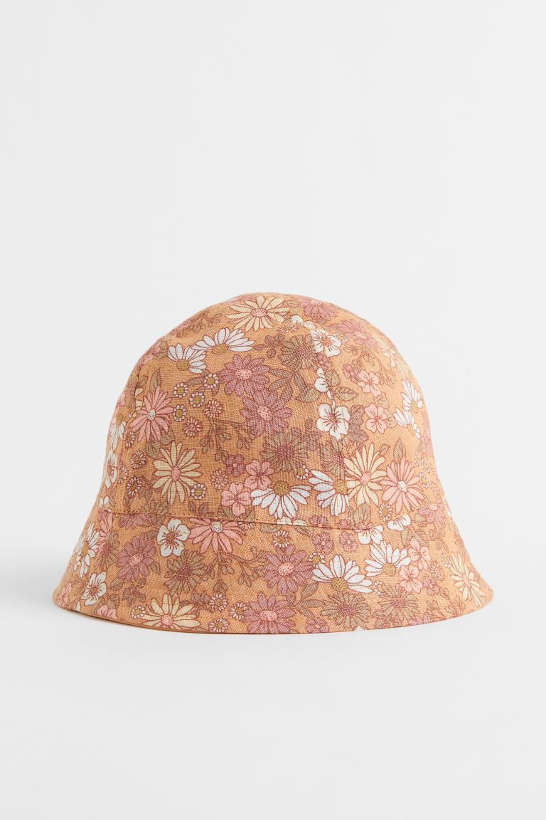 Baby Exclusive. Sun hat in soft linen. Lined in woven cotton fabric. Width of brim 2 in. | H&M (US)