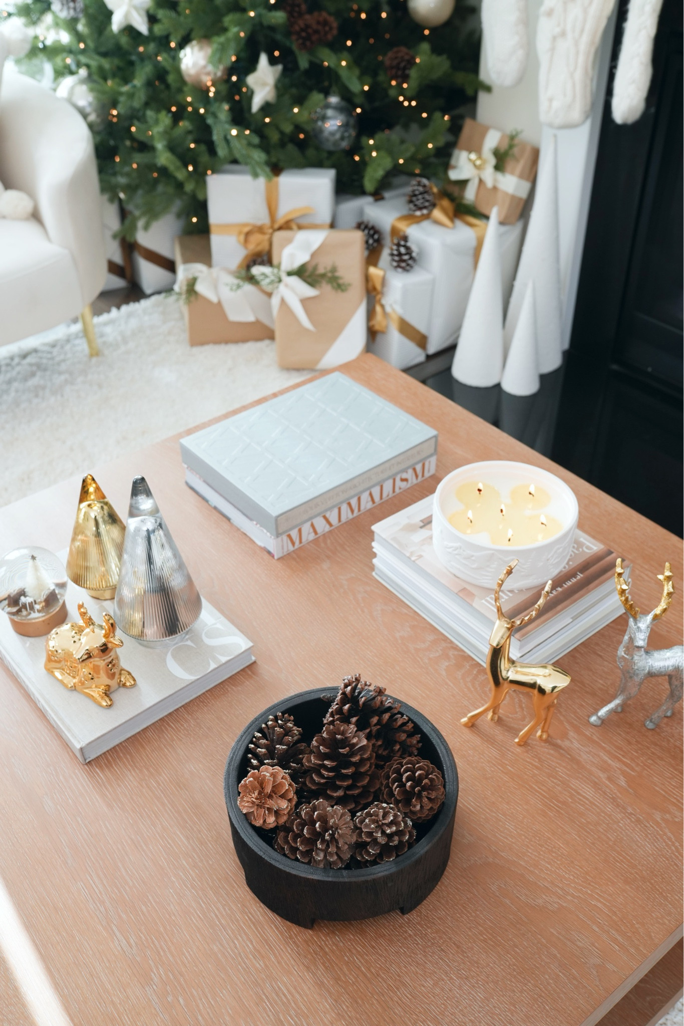 Holiday coffee stable styling , Christmas decor , coffee table decor , holiday decor , Christmas decor candles ,  glass Christmas tree , pine cones , pine cones bowls 

#LTKSeasonal #LTKHoliday #LTKGiftGuide