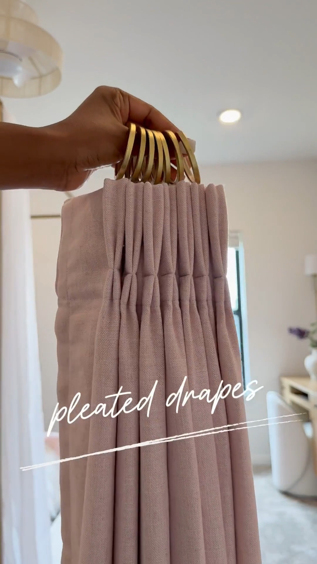 I'm absolutely in love with how these drapes turned out 👌🏾…..I've also got the same drapes in our guest room and great room.

Like many of you, I received a hefty quote for drapes a few years ago - 10K to be exact…..and that was just for three windows. 😅 I mean, who doesn't love the look of custom drapes? I particularly love the pinch pleat - it's my favorite. 😍 

One thing to keep in mind with this system is that you'll need to account for roughly 6 inches of slack. 🤎 So if your ceiling height is 108 inches, you'll need to order 102-inch drapes if you want to hang the rod at the very top and have the drapes ""kiss"" the floor. Thanks to hubby for helping me figure out precision & measurements. Shop now and  transform your home.

#LTKStyleTip 
#LTKSaleAlert #LTKHome