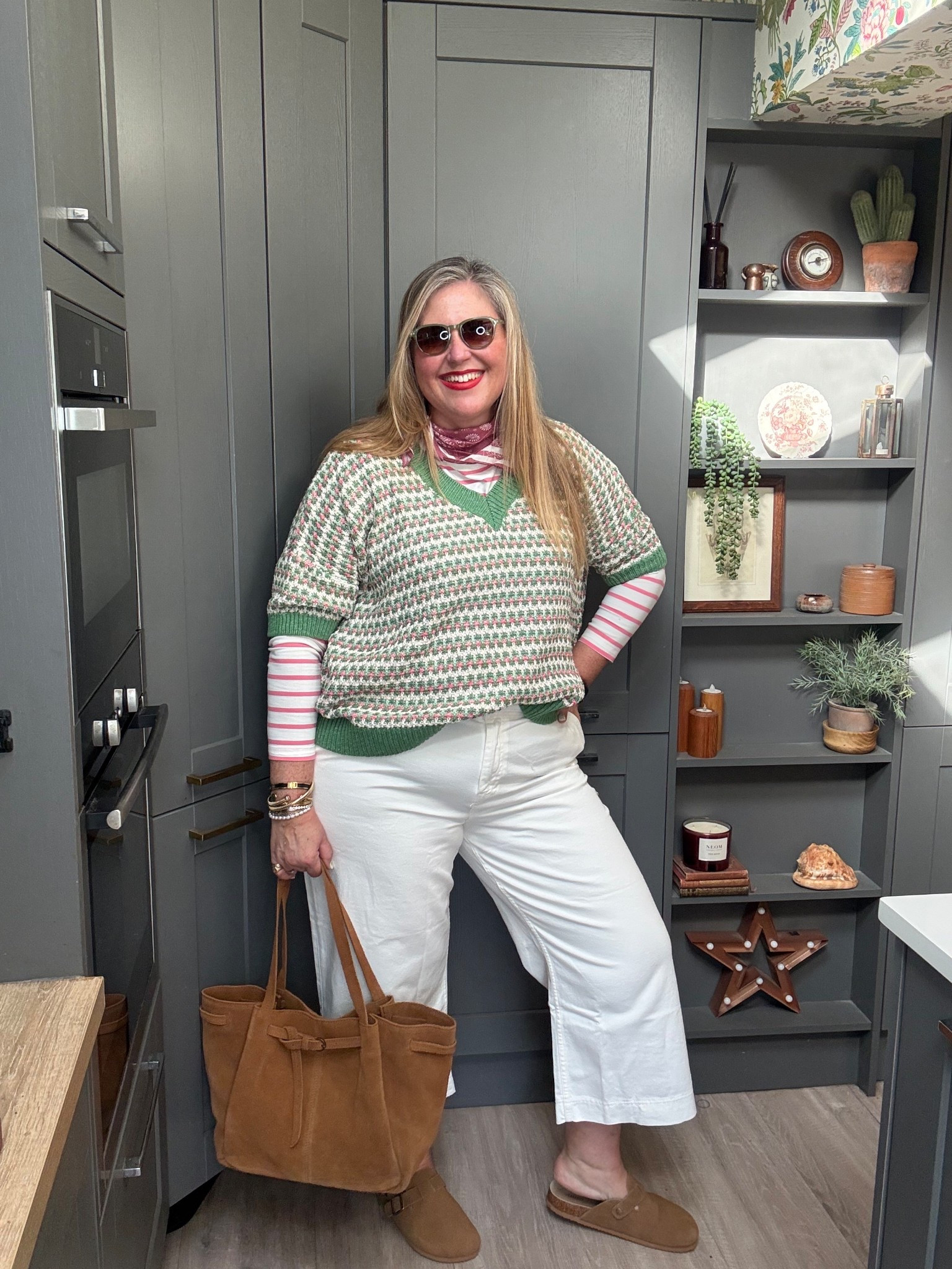 Spring inspo, cropped white jeans, pink striped Breton top, green and pink jumper, green sunglasses, tan mules, tan suede tote #LTKPlusSize #LTKOver40

#LTKspring