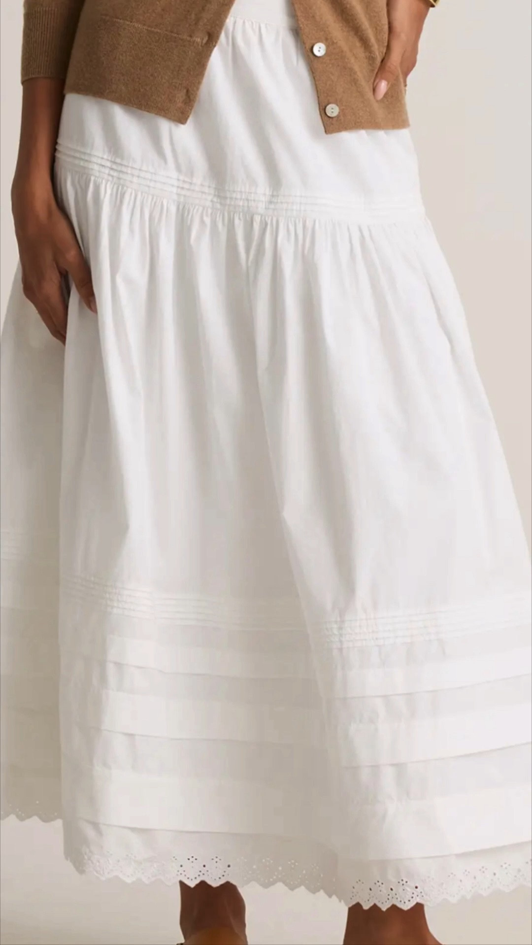 Look for less Doen white skirt!