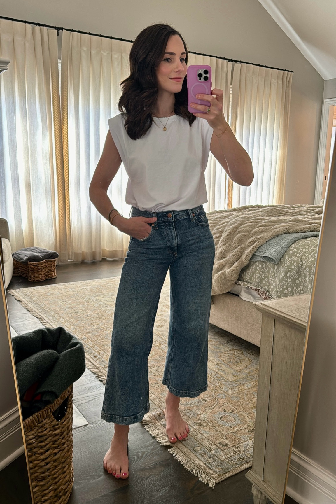 White cap sleeve tank and wide leg jeans! 

#LTKfindsunder50 #LTKstyletip