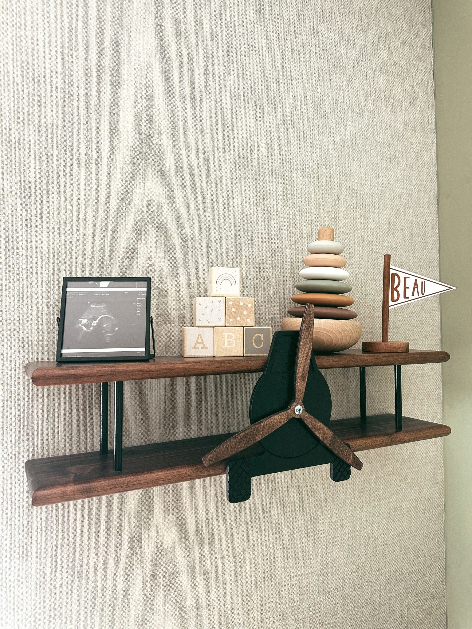 The vintage airplane nursery theme turned out so cute! I grabbed this Etsy airplane shelf and added some cute decor 

#LTKBump #LTKFamily #LTKBaby