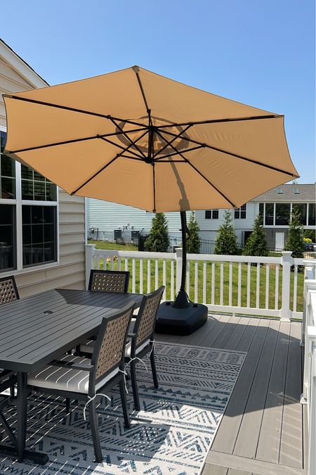 Outdoor table and chairs 
Outdoor umbrella
Outdoor rug  