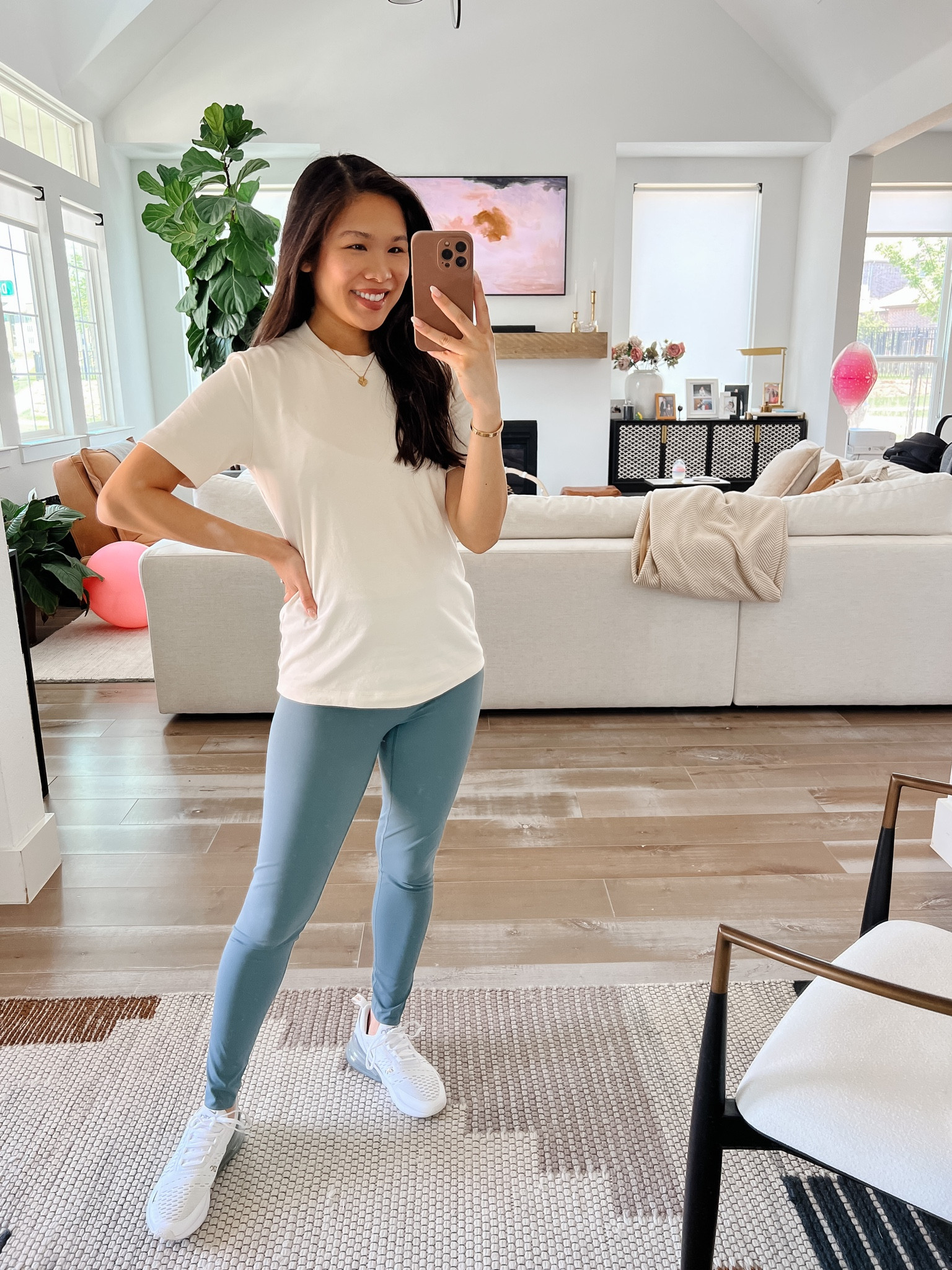 Athleisure outfit with Spanx booty boost leggings. I loved these as a maternity legging (size up 1-2 sizes) and now postpartum. Wearing size medium and I appreciate the looser fit right now. Code HKCUNGXSPANX gets you 10% off site wide. My t-shirt is a great elevated basic and code HKCUNG20 gets you 20% off your first purchase. 

#LTKstyletip #LTKsalealert #LTKfit
