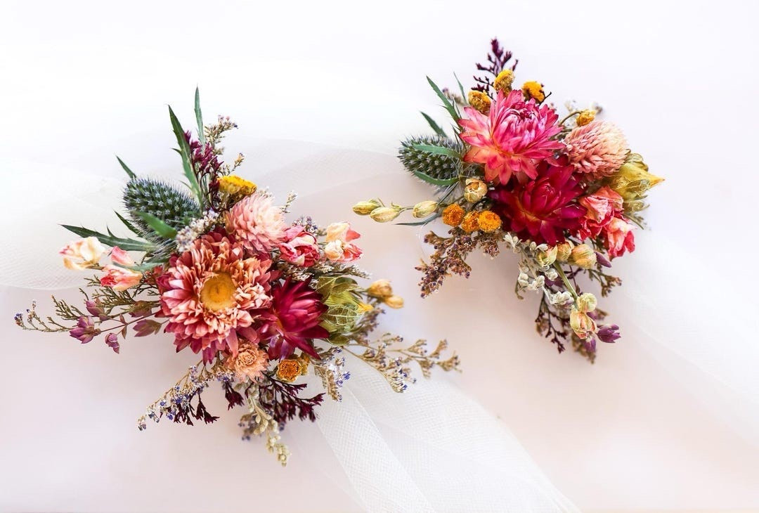 This large dried bridal bouquet by NustadFamilyRanch features a beautiful blend of organic lavender, pampas grass, wheat, winged everlasting, and straw flowers for a soft, natural look. With over 14-inch stems and certified organic, farm-direct flowers, this arrangement is perfect for weddings, crafting, or adding rustic charm to your home. Designed to last season after season, it’s a timeless piece that brings effortless elegance to any space.

#LTKWedding #DriedFlowers #BridalBouquet #RusticWedding #BohoWedding #PampasGrass #FloralDecor #OrganicFlowers #WeddingInspiration #EverlastingFlowers #LTKHome #NaturalDecor

#LTKHome #LTKWedding #LTKSeasonal
