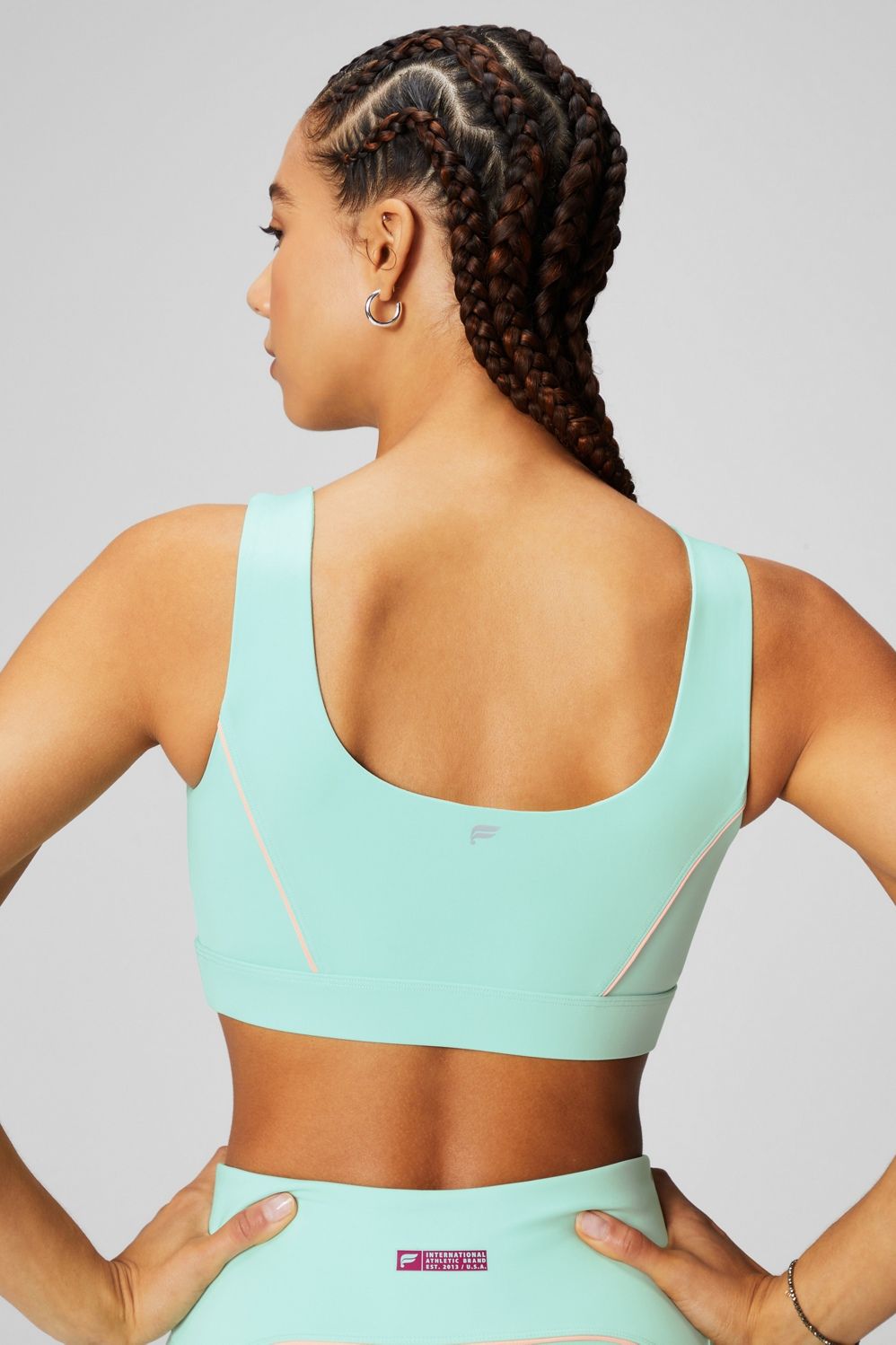 Medium Impact Piped Sports Bra | Fabletics - North America