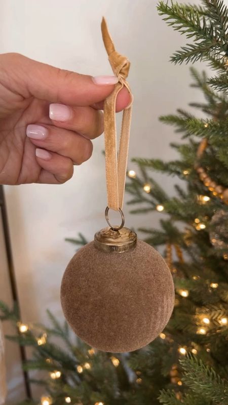 Want to elevate your Christmas tree ornaments? Just add velvet ribbon! Love adding velvet ribbon to all my ornaments and pretty much all of my holiday decor. 

#LTKVideo #LTKhome #LTKHoliday