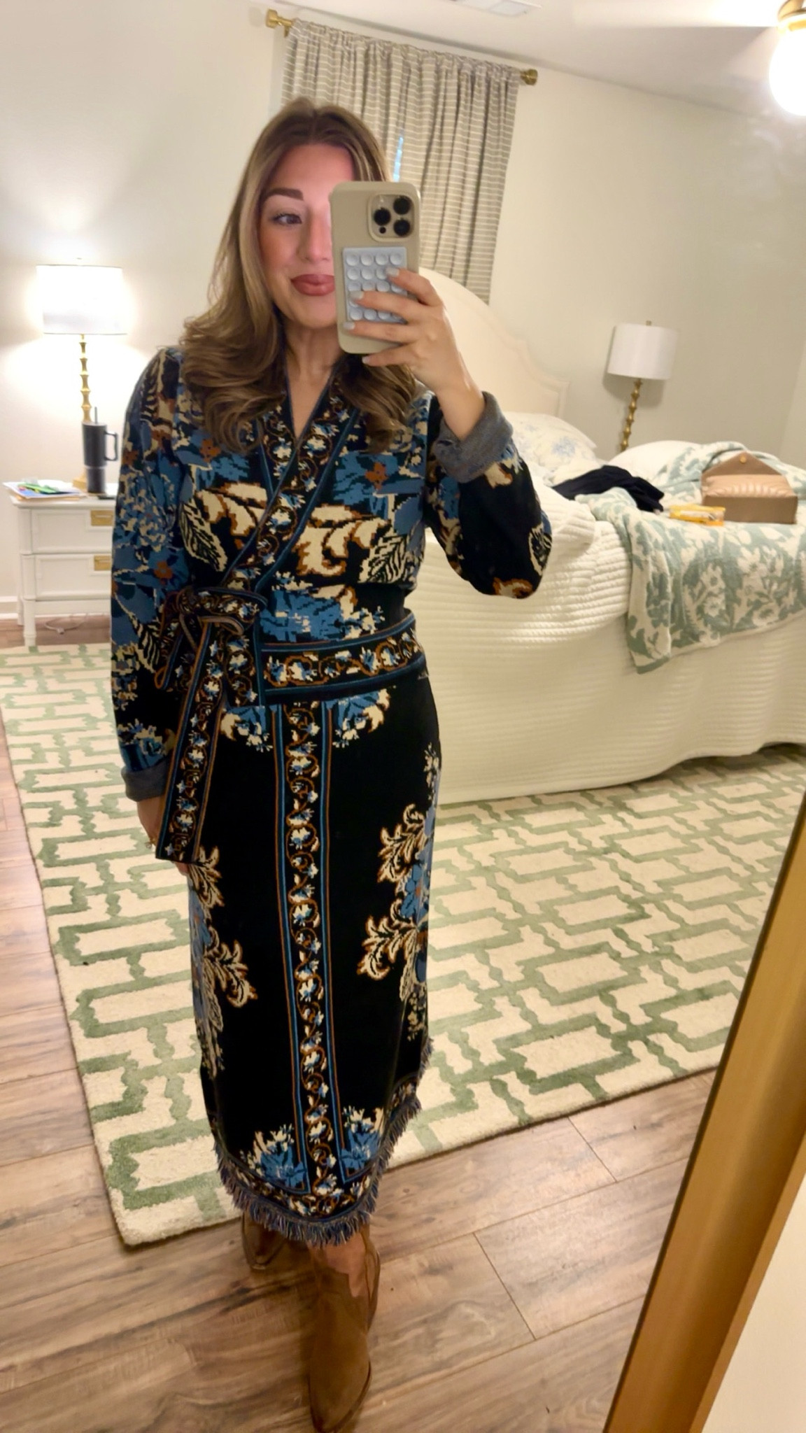 This #farmrio set has my whole heart! 💙🤎 The quality is top notch and the COLORS are to die for— they are so rich and beautiful. Sized up one to a medium (it was final sale and I panicked) but could have most definitely took my normal size small as it has lots of stretch and room! It’s so comfy — I’ll definitely be wearing this until the weather says I can’t anymore 😍 

#farmrio #knitset #midiskirt #western #grandmillenial #sweaterset #twopieceset #patternedmidi
