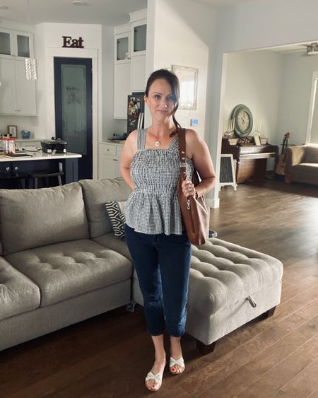 Easy casual travel outfit - smocked peplum tank + skinny jeans + leather boho tote + Italian leather slides. 

Off on a mini girls’ getaway to see my sister! xo 

#LTKFind #LTKSeasonal #LTKtravel