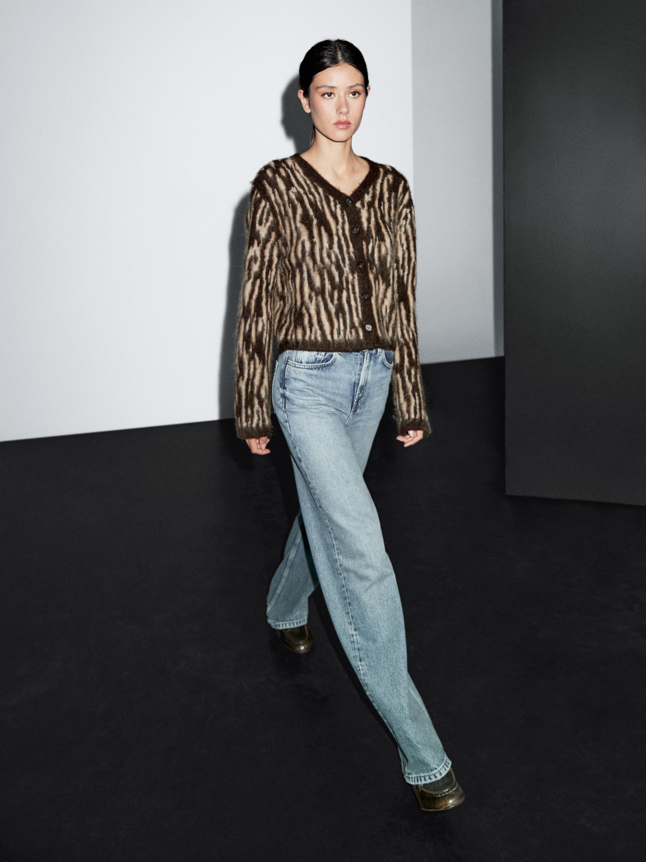 Knit cardigan made of wool and alpaca blend fabric. V-neck. Long sleeves. Button-up front. Cuff a... | Massimo Dutti US