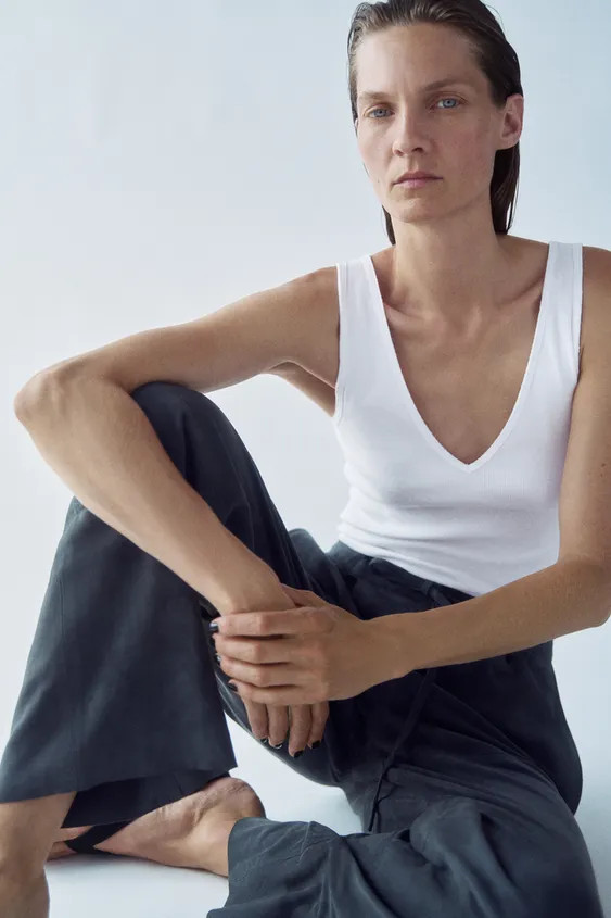 Top made of cotton blend yarn. V-neckline and wide straps. Ribbed fabric. | Zara US