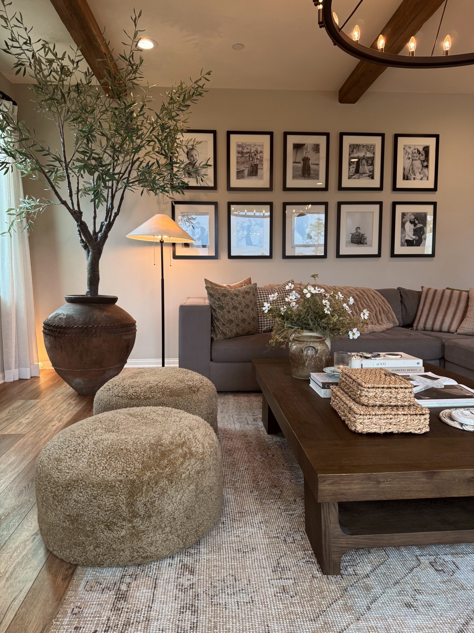Living room views. Pot vessel is 1 of 1. I linked similar options. 
.
NOTE: Sofa has been discontinued. Frames are size 16x20. Ottomans are in the size large in the color butterscotch. Coffee table is from Restoration Hardware (Davos Collection.) 

#LTKU #LTKHome #LTKActive