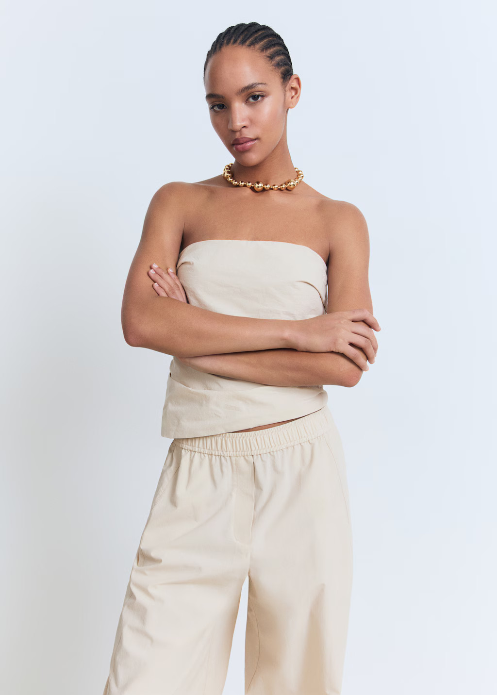 Asymmetrical strapless top | MANGO (UK)