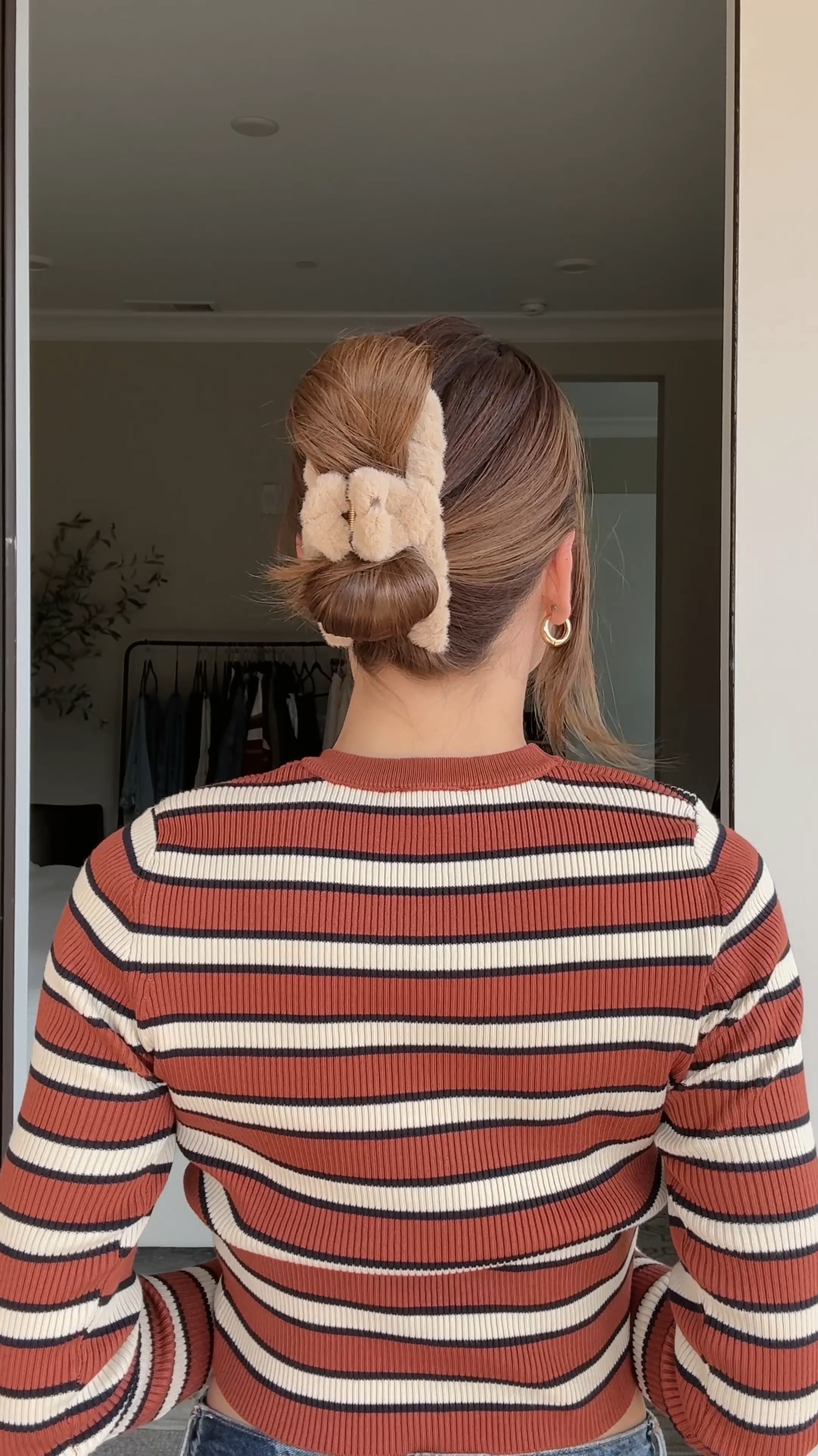 Fall Claw Clip Hairstyle 🍂

Gather your hair into a low ponytail. Place one hand on top of the ponytail. Lean slightly forward in order to flip the ponytail upward, over your thumb. Wrap a hair tie around the base to create a mini bun as many times as needed to feel secure. Fold the remaining hair in half; placing the ends beside the bun. Secure with a fall-inspired claw clip for a cozy, effortless look.

#LTKSeasonal #LTKVideo #LTKFindsUnder50
