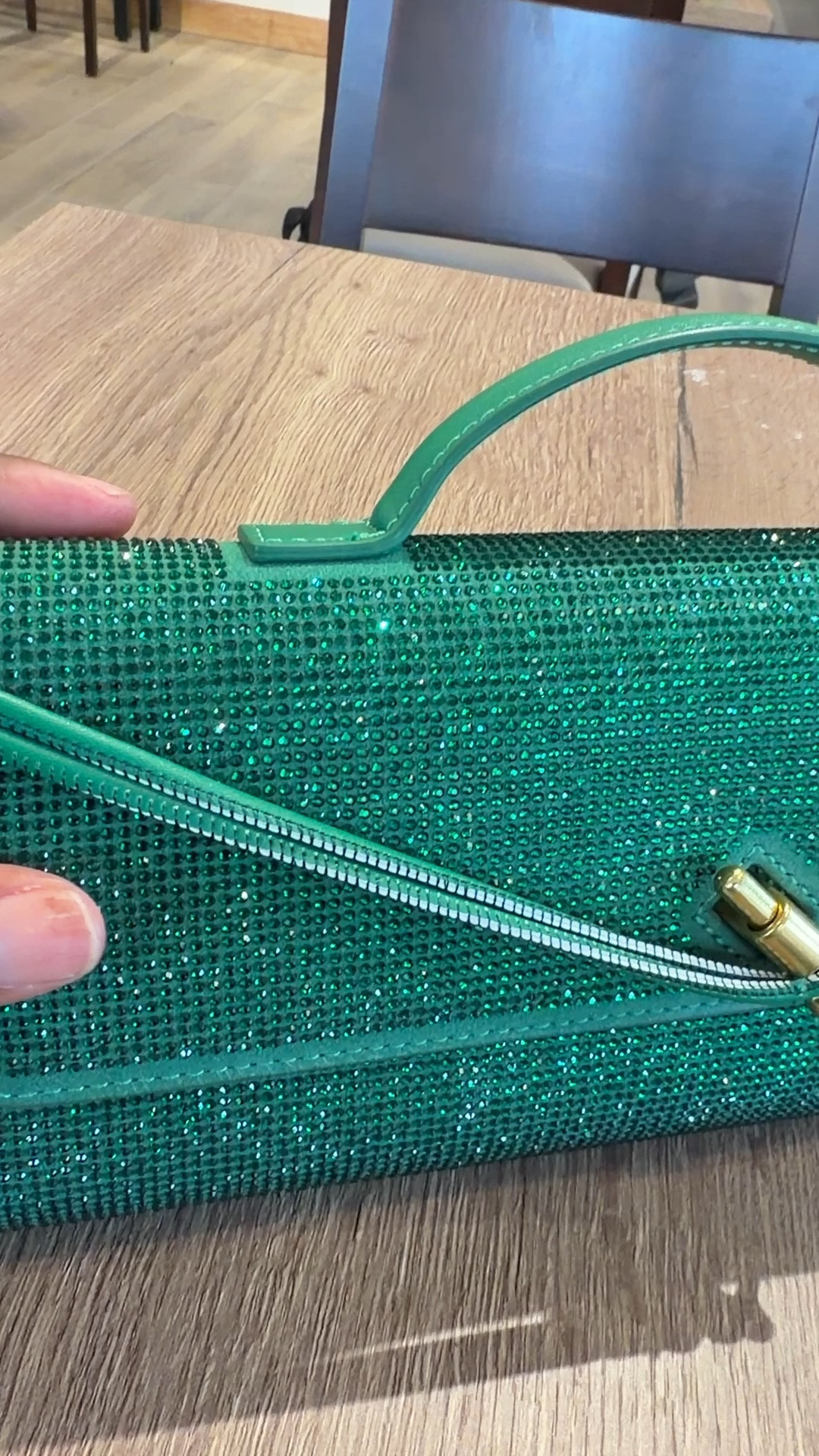 This clutch handbag is gorgeous! It’s from Amazon and under $50 bucks. 