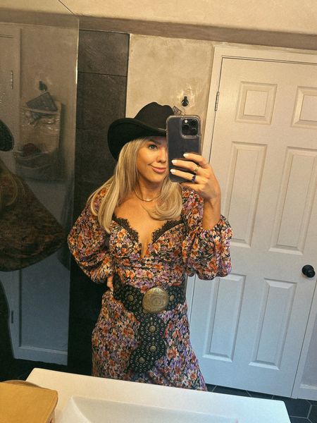 Obsessed with this western chic look from Revolve. Wearing an XS in this floral maxi dress. Perfect paired with this chunky black western belt, black cowboy hat and black cowboy boots 

#LTKfindsunder50 #LTKstyletip #LTKfindsunder100