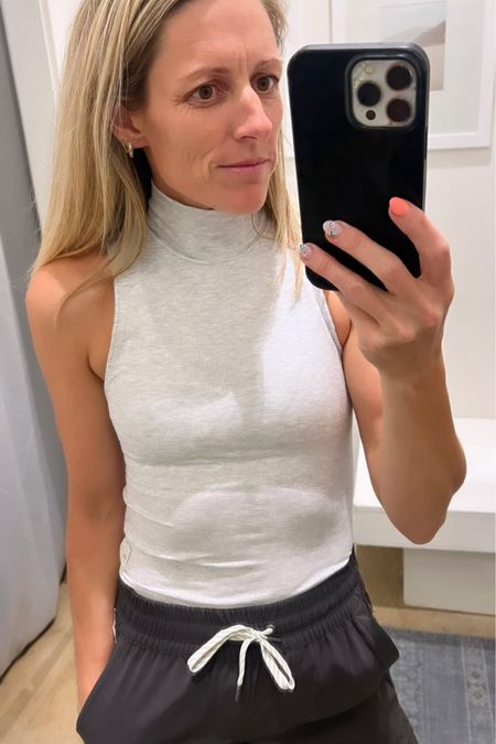 Loving this sporty ribbed mock neck tank for fall paired back with joggers.  This versatile top can also be paired with a great wide leg pant for work. 

Active tops | casual outfits | fall outfits 

#falloutfit #activetop #weekendoutfit #falltops #fallactivewear

#traveloutfit #airportoutfit

#LTKworkwear #LTKSeasonal #LTKtravel