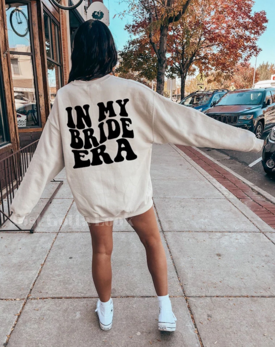In My Bride Era Sweatshirt from justgottalook

Retro Bride Sweatshirt | Future Mrs Sweater | Bride Gift | Fiancee Crewneck | Engagement Gift | Bridal Shower Gift | Bachelorette Gift | Eras Tour | Taylor Swift

 

#LTKMostLoved #LTKstyletip #LTKwedding