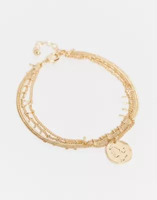 ASOS DESIGN - Bracelet de cheville multirangs avec breloque pièce et chaîne motif serpent - Dor... | ASOS (Global)