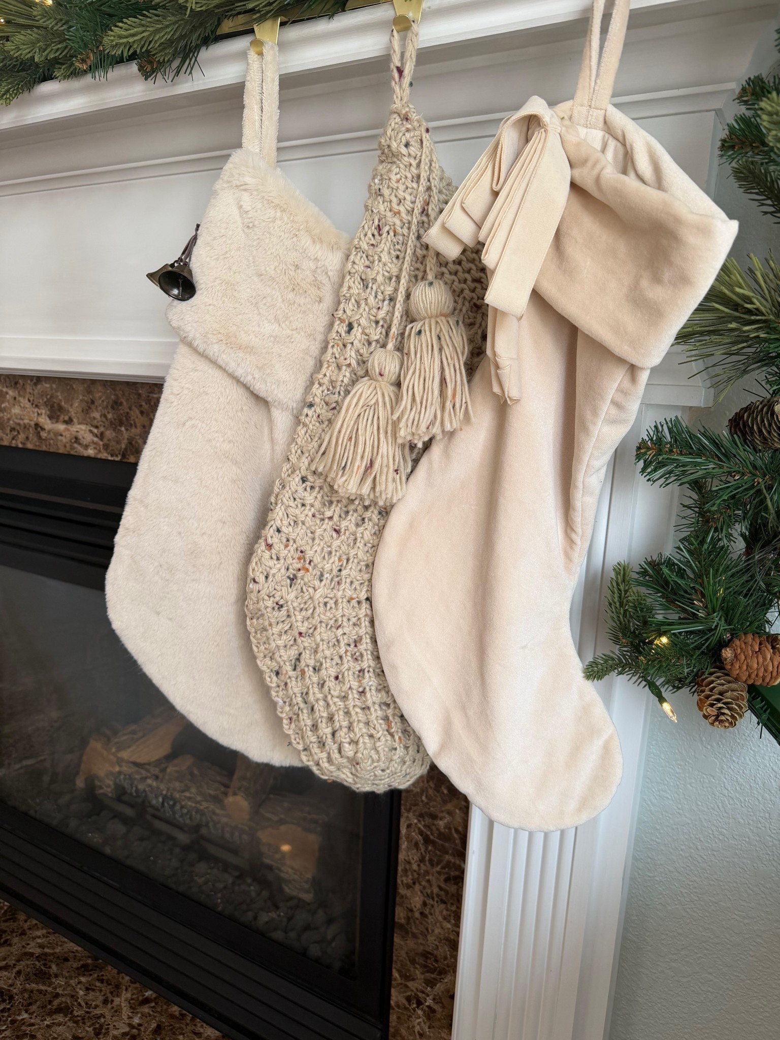 Mix and match stockings 
Mantle pre-lit garland 

Target Christmas decor


#LTKHoliday #LTKHome #LTKFindsUnder100