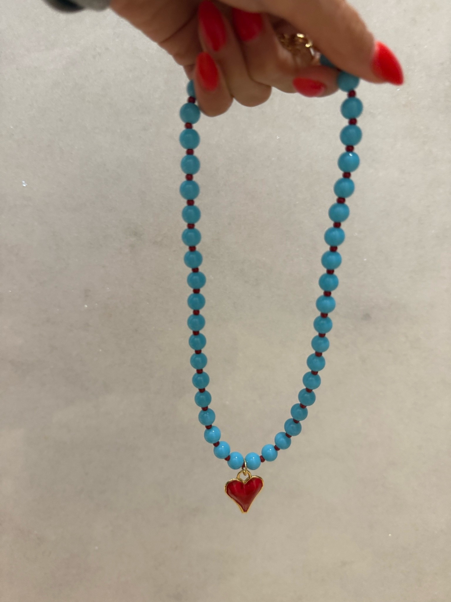 How cute and fun is this beaded necklace with heart charm

#LTKSeasonal #LTKOver40