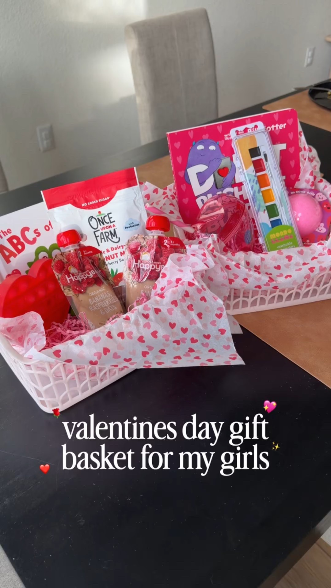 Valentine’s Day gifts for my girls, but make it simple & practical! 💗 (1yo & 2 yo) 

We love adding a themed book to our February book rotation! 

#toddlervalentines #valentinesdaybaskets #toddlervalentinegifts #babyvalentinesgift #valentinesdaybasketsforkids