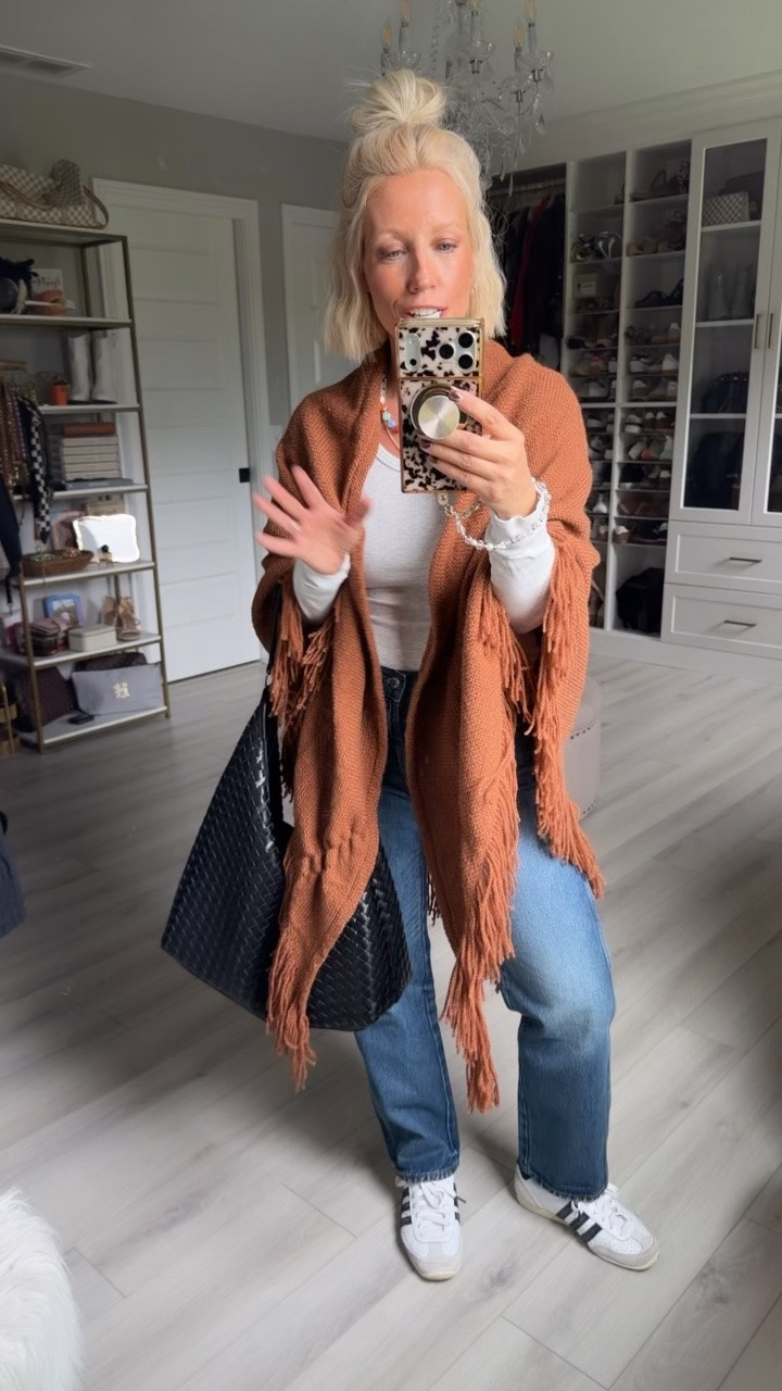 These poncho/wraps are trending for fall!!! 
⬇️⬇️⬇️
Long sleeve tee small
Wrap one size
Jeans sized down to a 2 (run big)